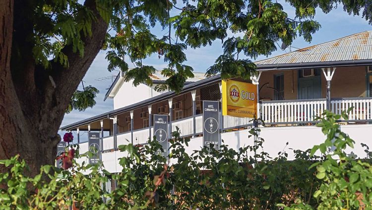 View of the Cunnamulla Hotel through the leaves of a tree